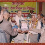 Sh Ashok Sharma giving awards